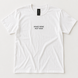 A white short-sleeve crewneck t-shirt with the text 'MAKE WINE NOT WAR' printed in black sans-serif font on the center chest. The shirt is laid flat against a light off-white background, showing a black neck label with the brand 'GILDAN' visible.
