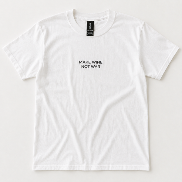 A white short-sleeve crewneck t-shirt with the text 'MAKE WINE NOT WAR' printed in black sans-serif font on the center chest. The shirt is laid flat against a light off-white background, showing a black neck label with the brand 'GILDAN' visible.